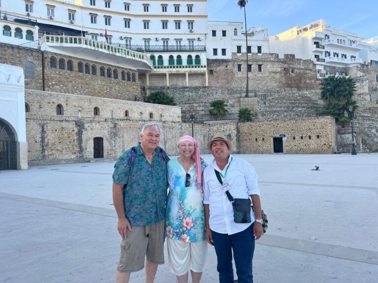 Guests and guide at the Tangier seafront