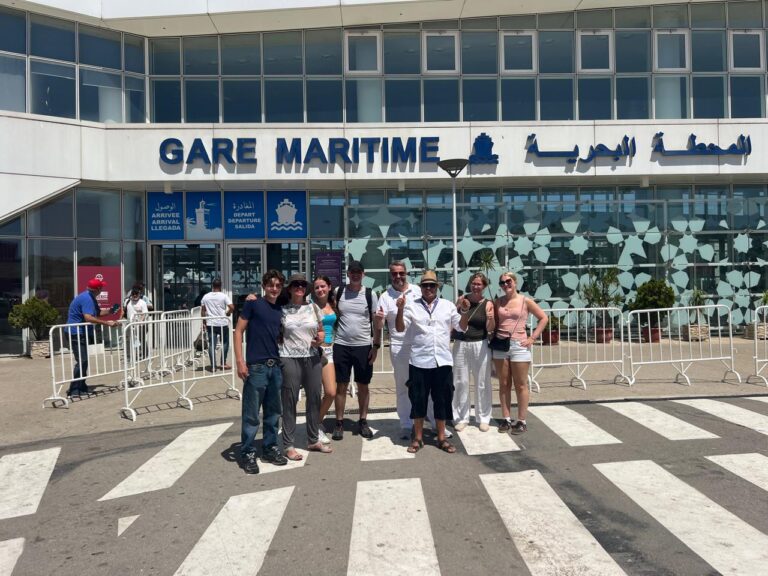Guests and guide in front of the Gare Maritime in Tangier